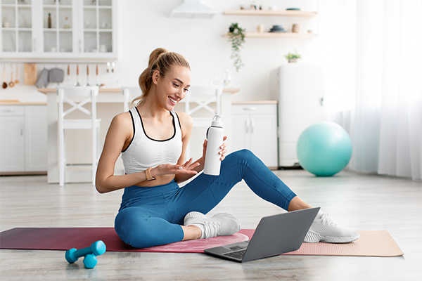 red fitness mat with moon print on it