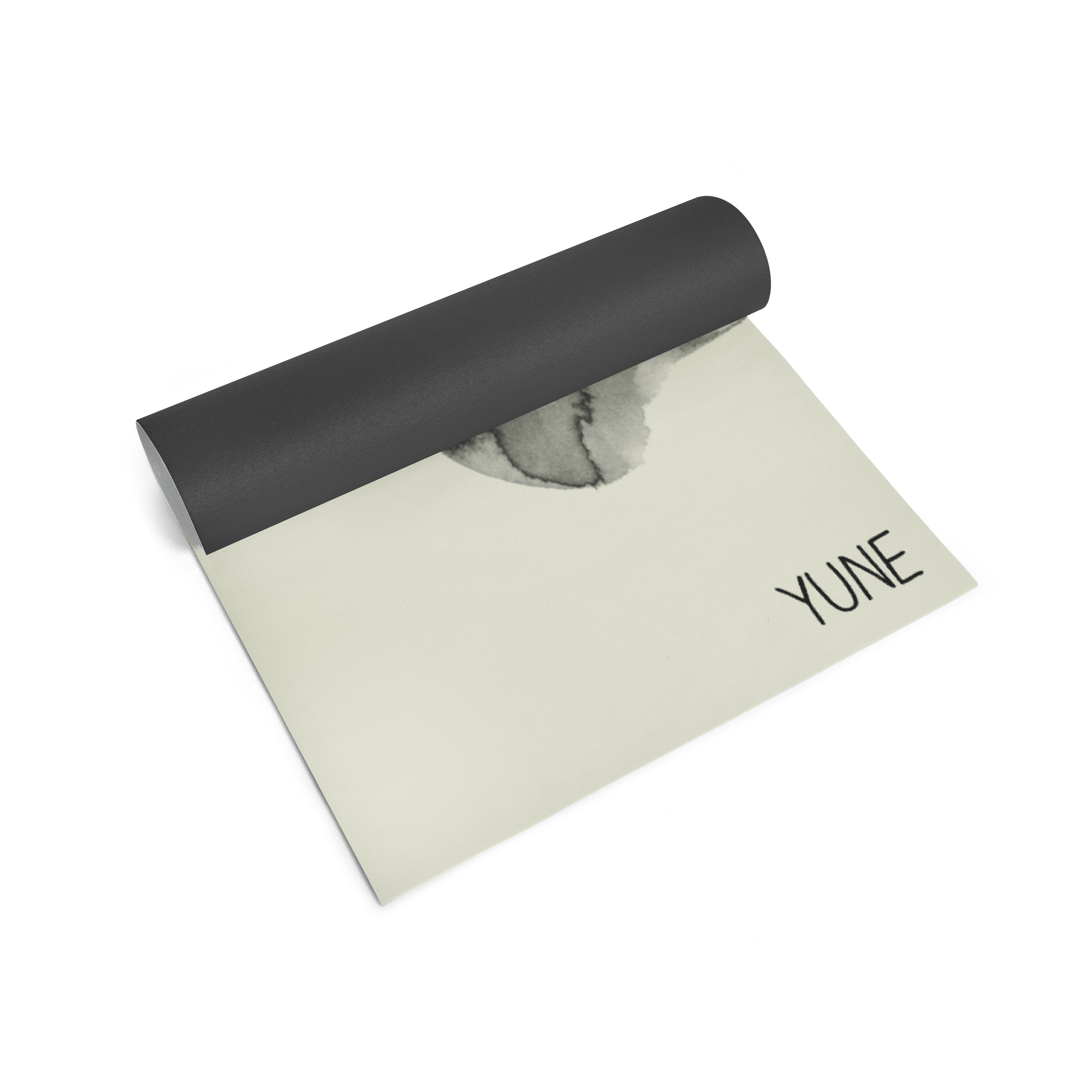 Yoga mat with black top and beige bottom displaying 'YUNE' brand on a white background