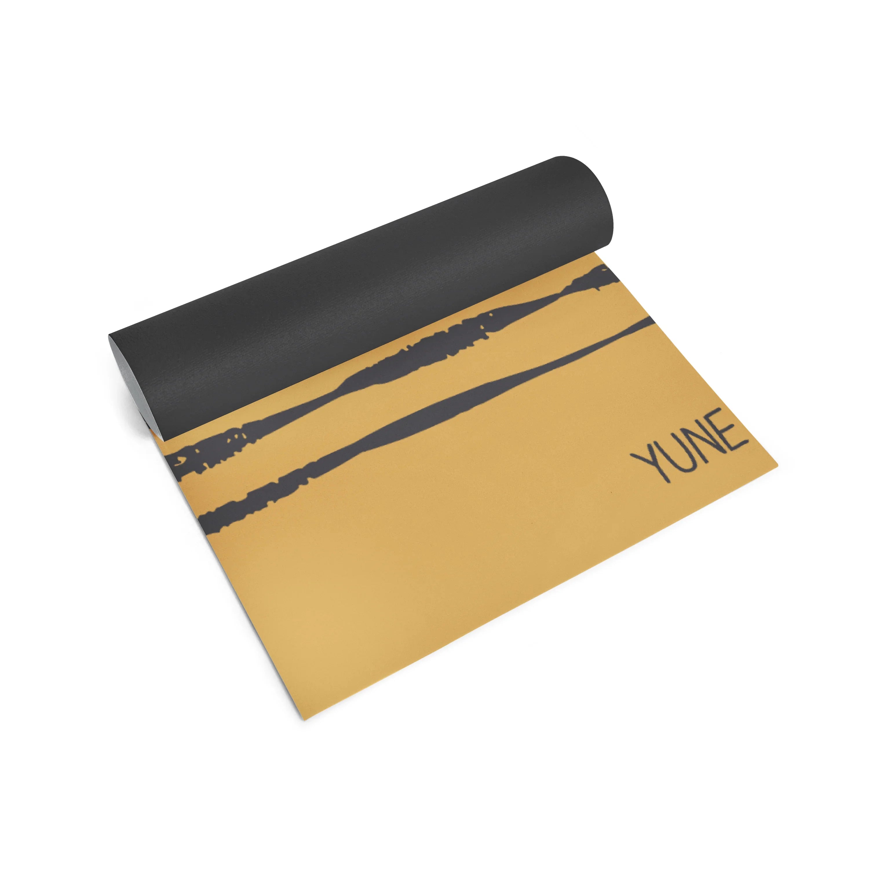 Yoga mat with black and yellow design on a white background