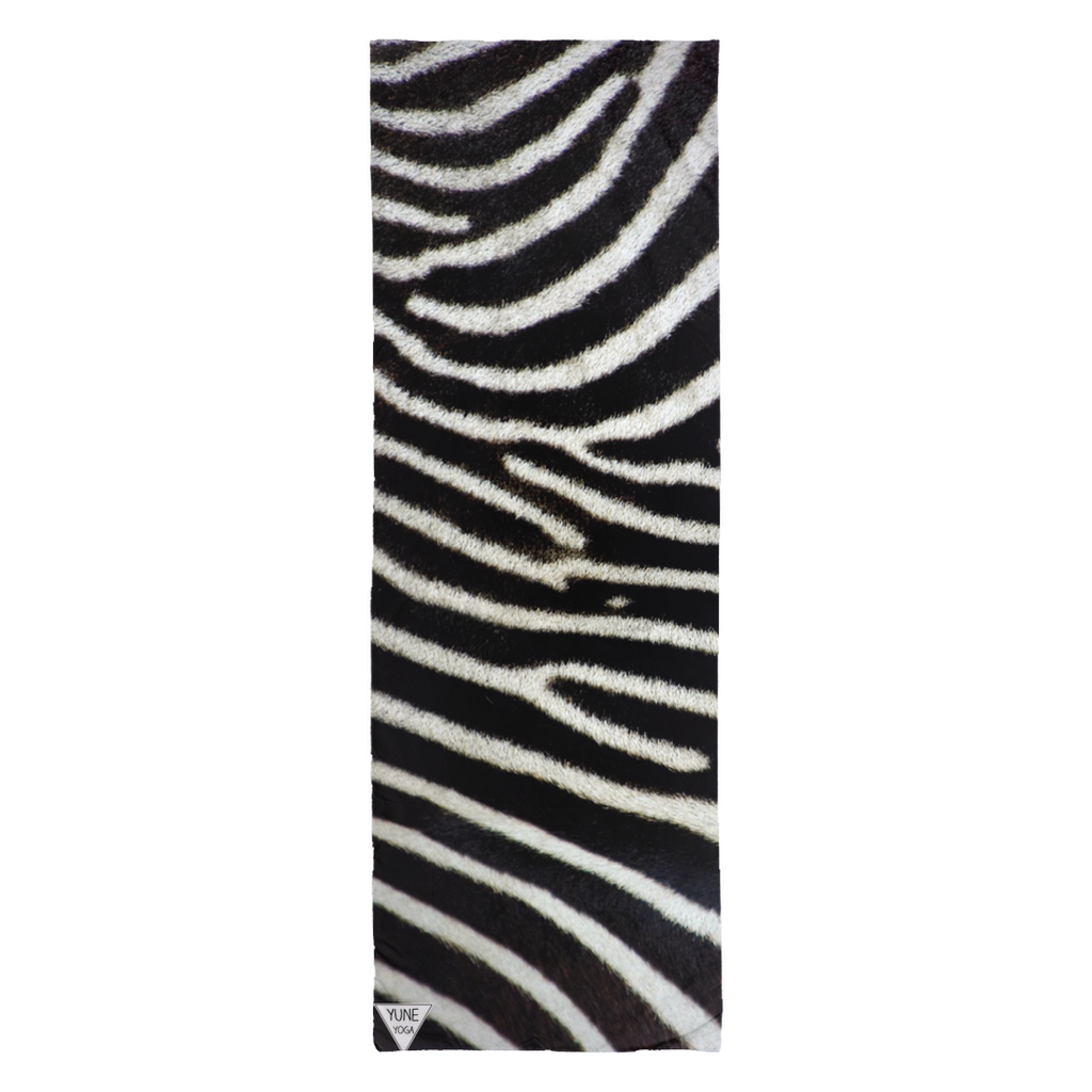 Black and white zebra patterned towel on a white background